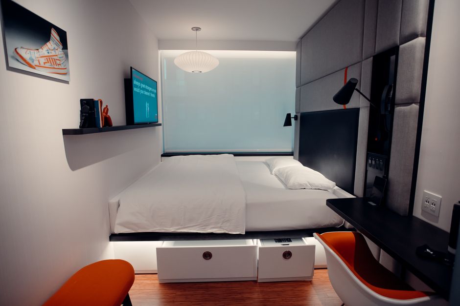 Under-Bed Boxes around a statement mirror — home · Organization