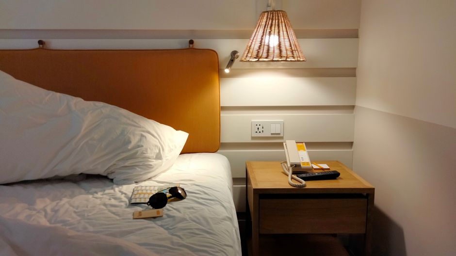 Bedside Sconce with coordinated hardware — home · Bedrooms