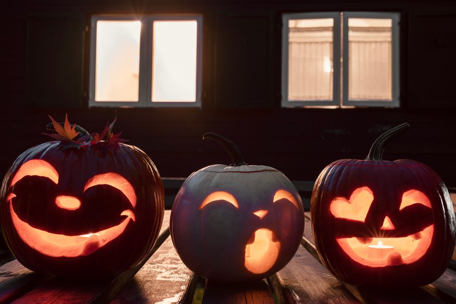 Carved Pumpkin Cluster around a handmade centerpiece — celebrations · Halloween