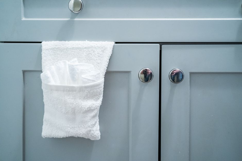 Towel Hook around a statement mirror — home · Bathrooms