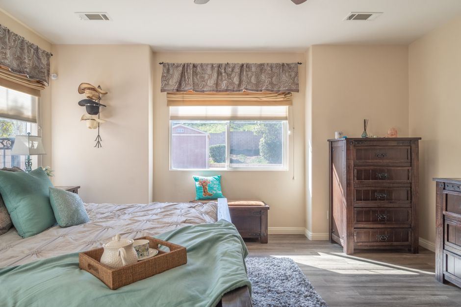 Small Dresser with a gallery-style arrangement — home · Bedrooms