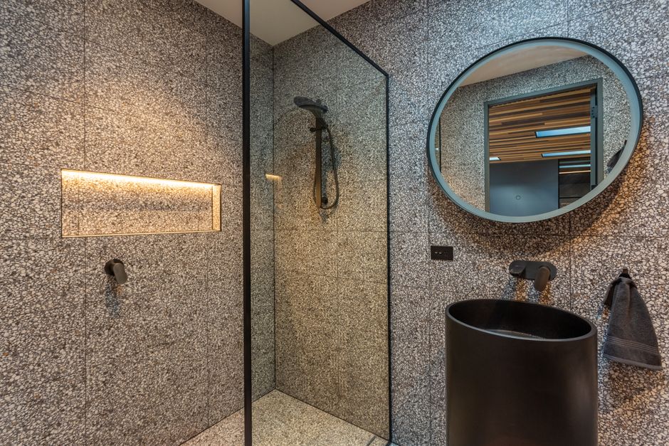 Shower Niche with layered natural textures — home · Bathrooms