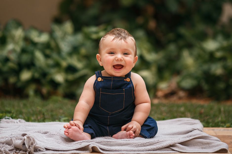Baby-Photo Guessing Game around a themed snack table — celebrations · Baby Showers