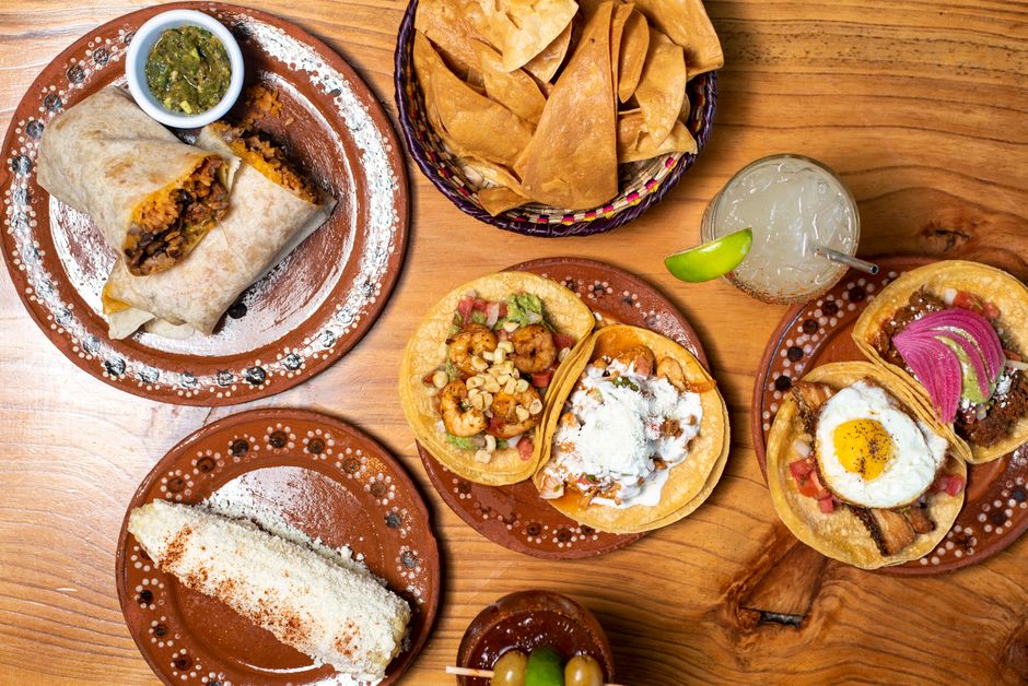 Build-Your-Own Taco Bar with labeled serving bowls — food · Food & Hosting