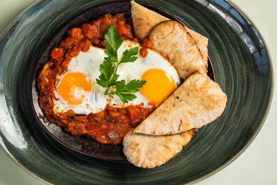 Shakshuka Skillet with herb cream cheese — food · Breakfast & Brunch