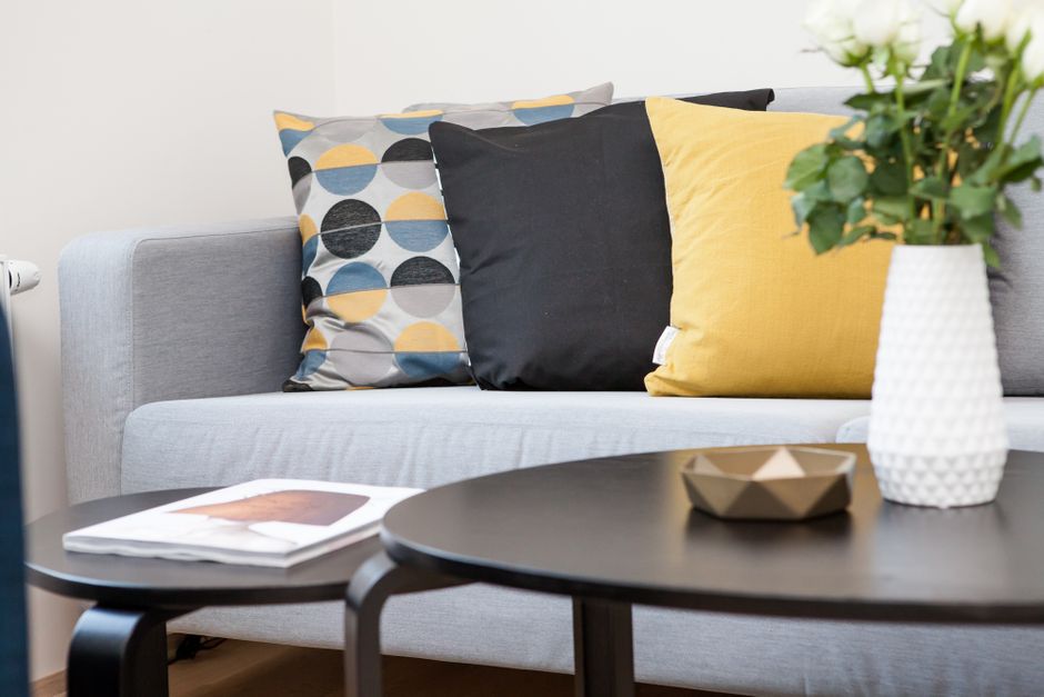 Layered Pillows with warm evening lighting — home · Bedrooms