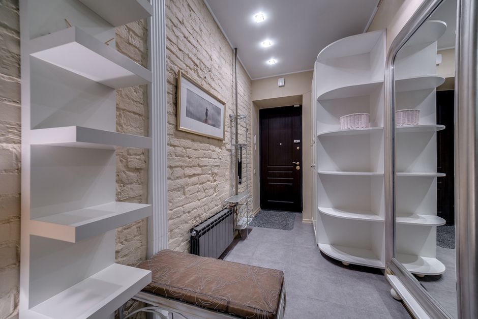 Compact Foyer in a warm oak palette with layered natural textures — home · Interior Design