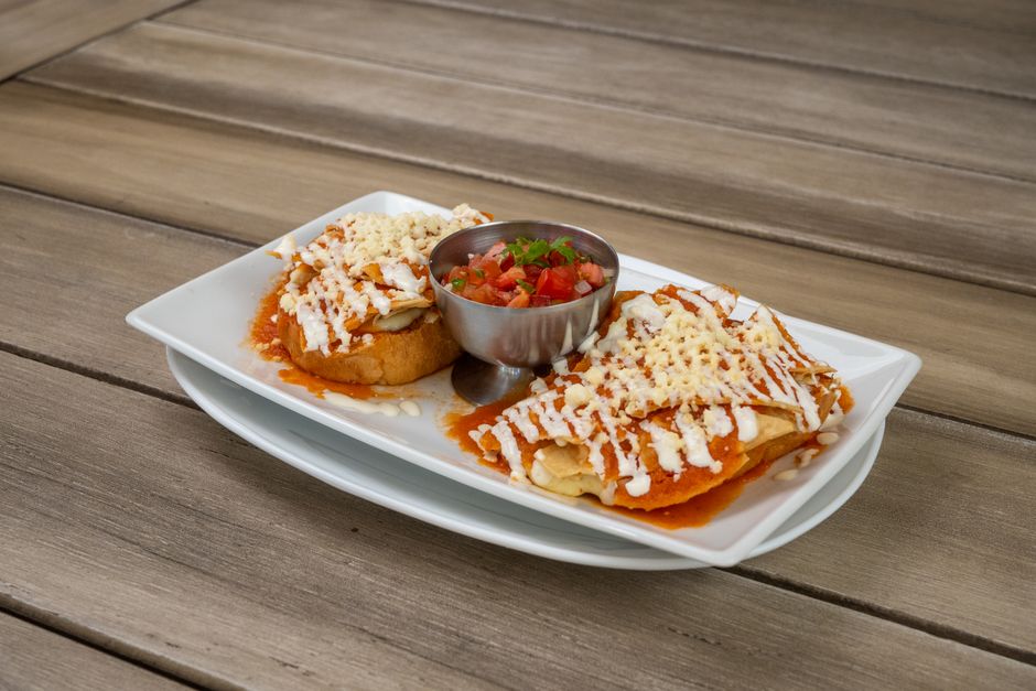 Black Bean Enchiladas for a family-style table — food · Dinner Ideas
