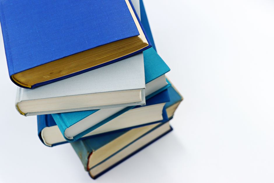 Book Stack with one sculptural accent — home · Living Rooms