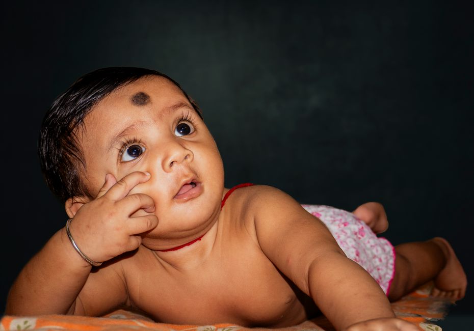 Baby-Photo Guessing Game with a nostalgic detail — celebrations · Baby Showers