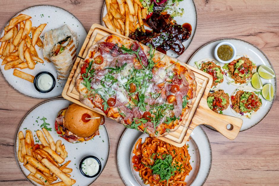Pasta Night Spread with a warm centerpiece dish — food · Food & Hosting
