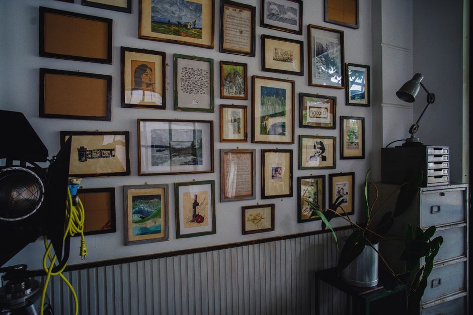 Gallery Wall with warm oak accents — home · Home Decor