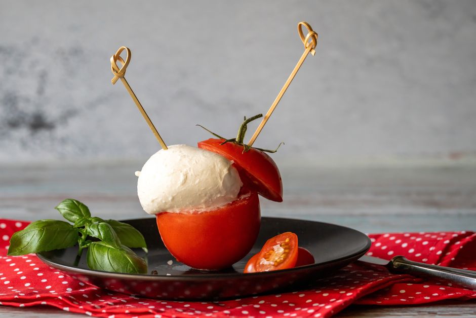 Caprese Skewers with a colorful garnish — food · Party Food