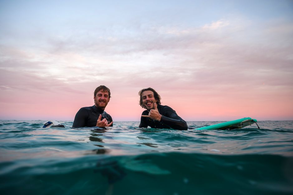 Sunrise Swim near a signature landmark — travel · Beach Vacations