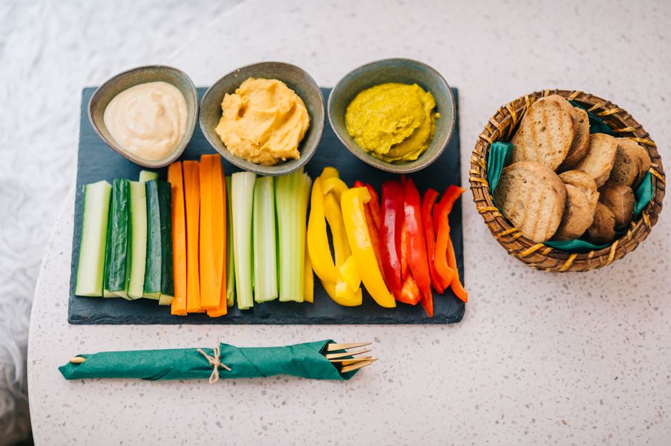Cucumber Hummus Cups with parmesan crunch — food · Snacks