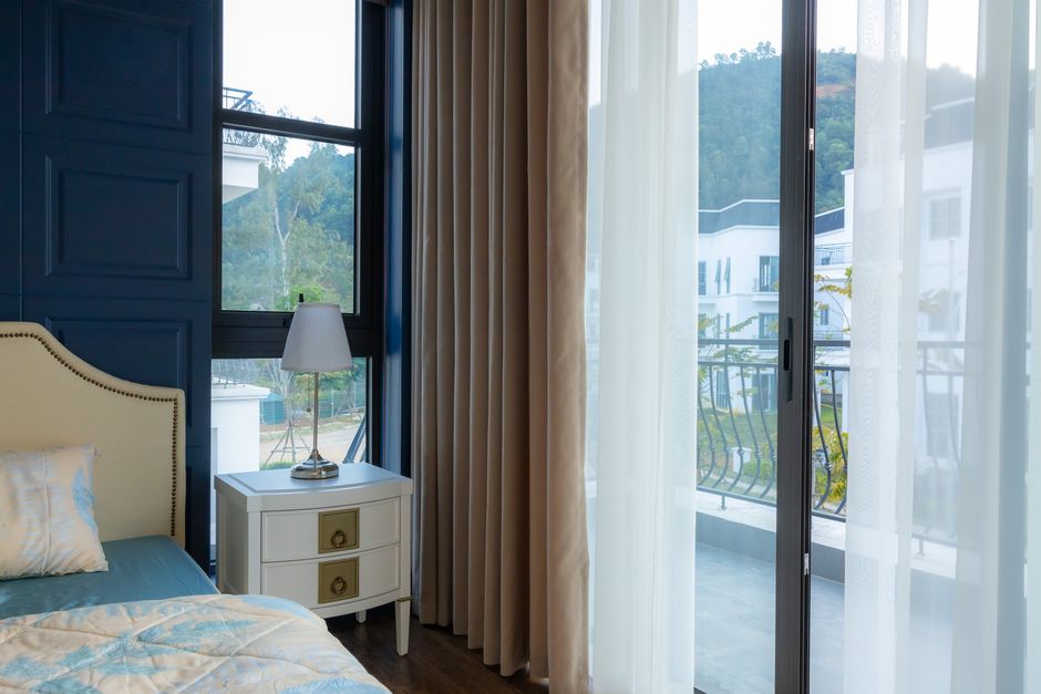 Linen Curtains around a sculptural lamp — home · Home Decor