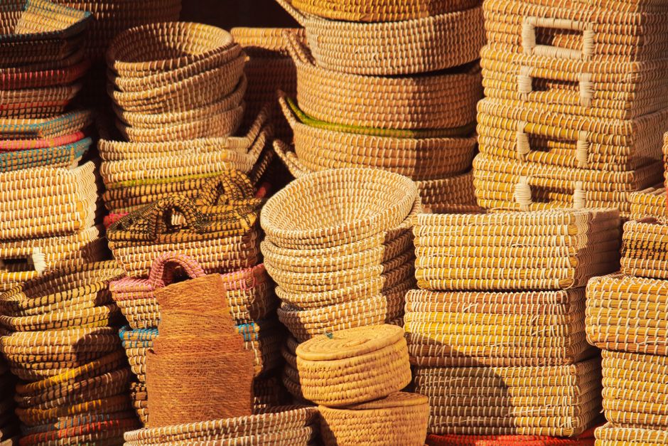 Woven Basket around a sculptural lamp — home · Home Decor