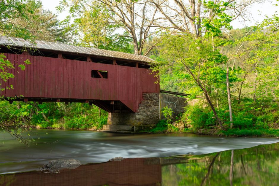 Covered Bridge near a hidden garden — travel · Road Trips