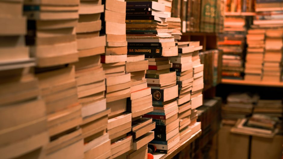 Book Stack with warm evening lighting — home · Living Rooms