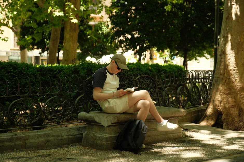 Park Bench Reading Stop for travelers avoiding crowds — travel · Solo Travel