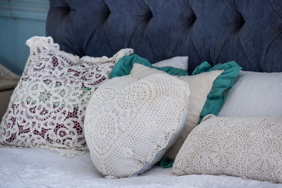 Layered Pillows with a cozy corner detail — home · Bedrooms
