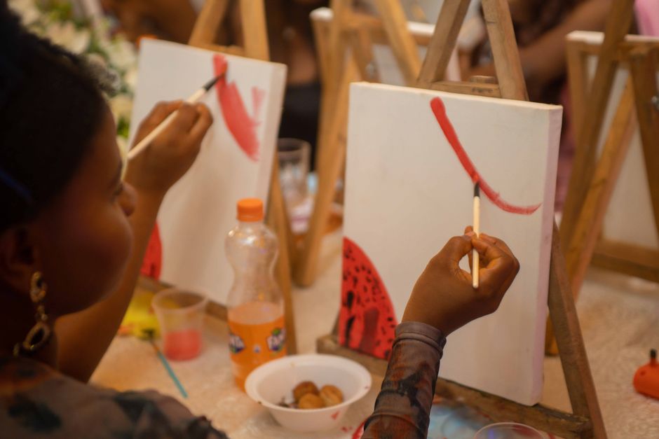 Paint-And-Sip Night around a quick team challenge — entertainment · Date Nights