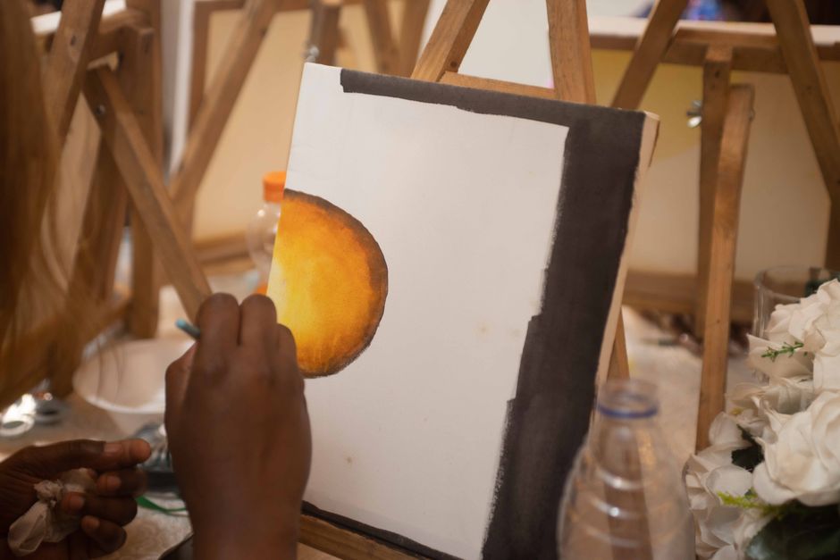 Paint-And-Sip Night around a shared playlist — entertainment · Date Nights