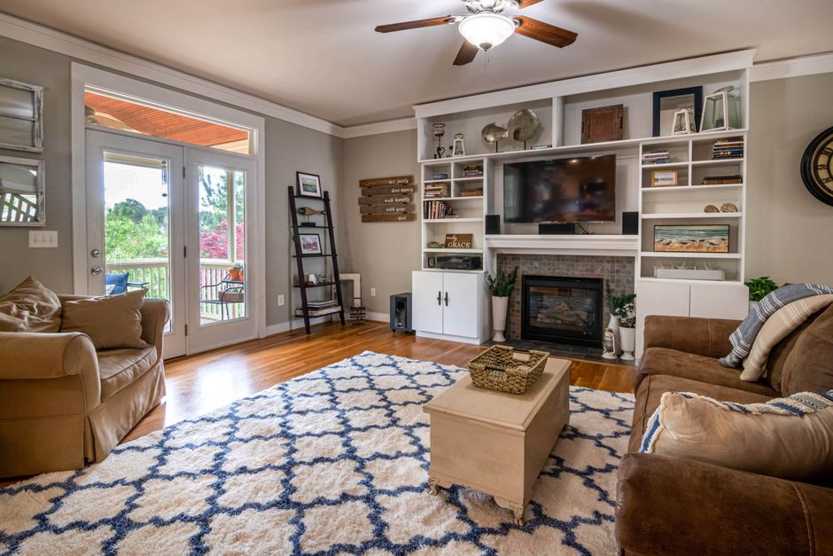 Large Rug with a soft curved silhouette — home · Living Rooms