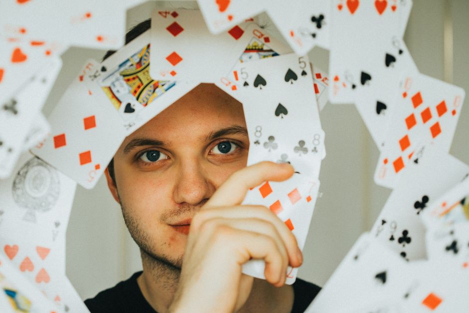 Learn A Card Trick around a music round — entertainment · Things to Do