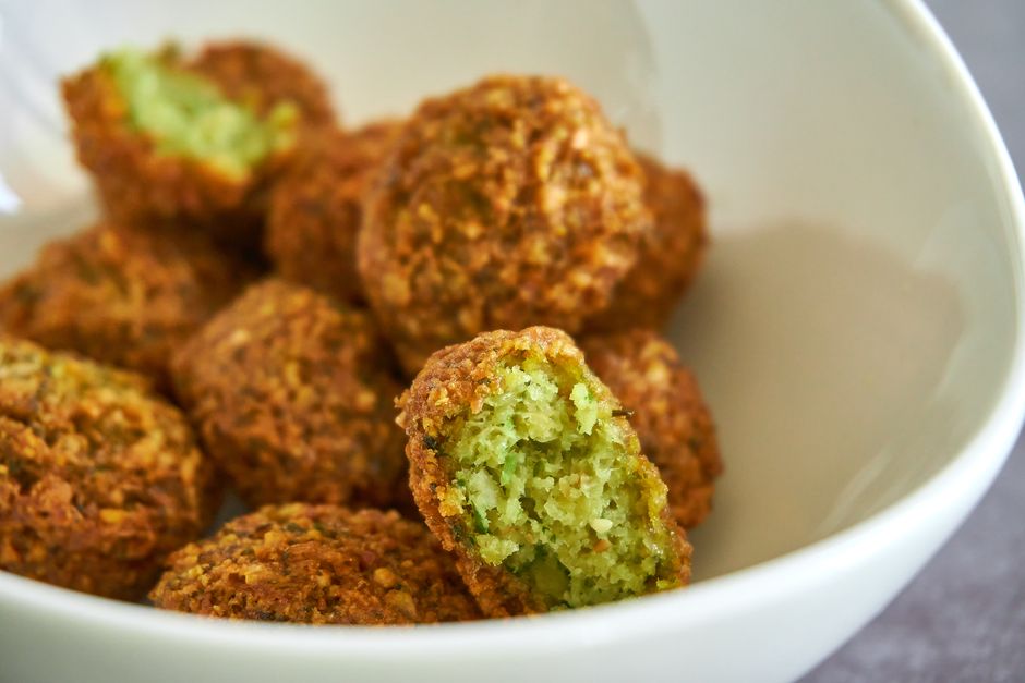 Baked Falafel Bites with a colorful garnish — food · Party Food