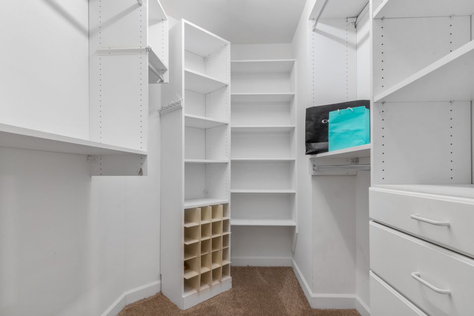 Closet Dividers using mixed wood tones — home · Organization