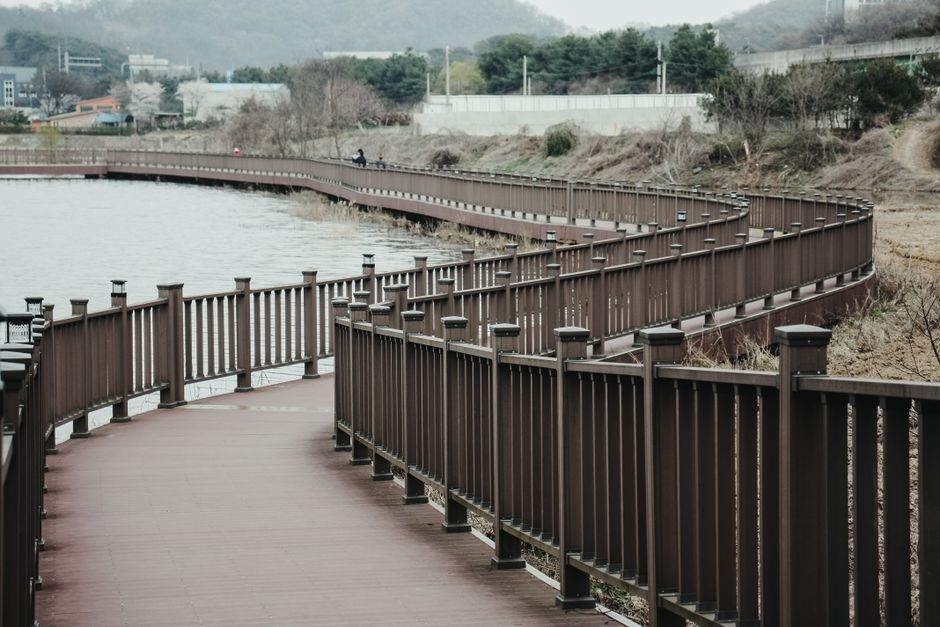 Riverfront Promenade near a quiet beach access — travel · City Trips