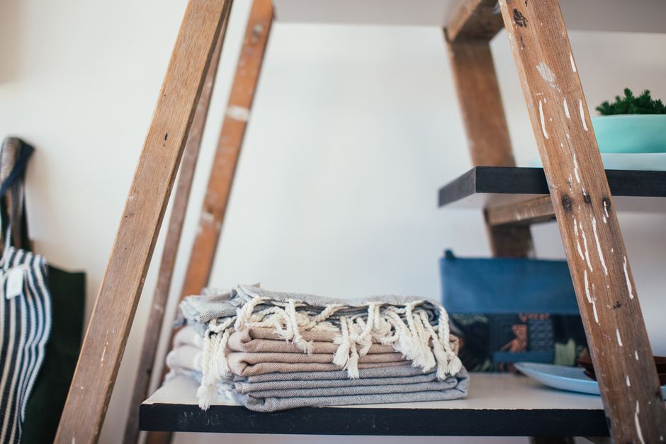 Linen Shelf with warm evening lighting — home · Organization