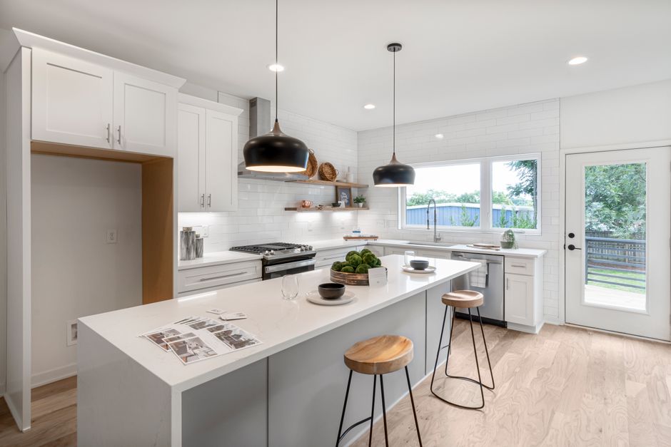 Island Styling in a warm oak palette with layered natural textures — home · Kitchens