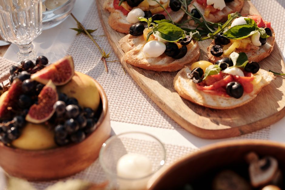 Mediterranean Snack Board with a warm centerpiece dish — food · Food & Hosting