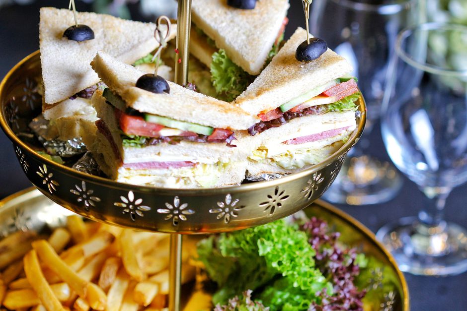 Cucumber Tea Sandwiches with a colorful garnish — food · Party Food