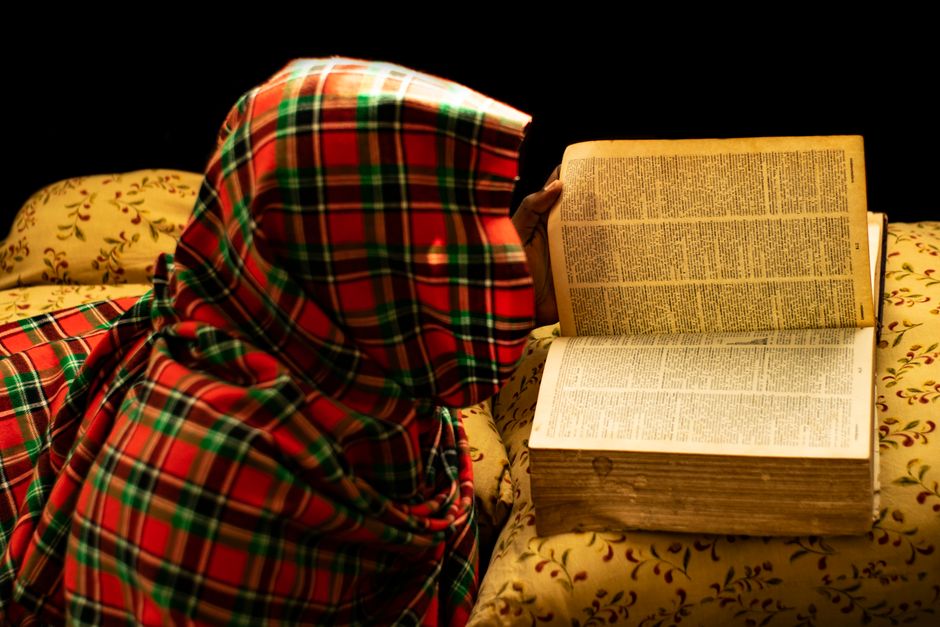 Book-And-Blanket Hour during a quiet evening — wellness · Relaxation
