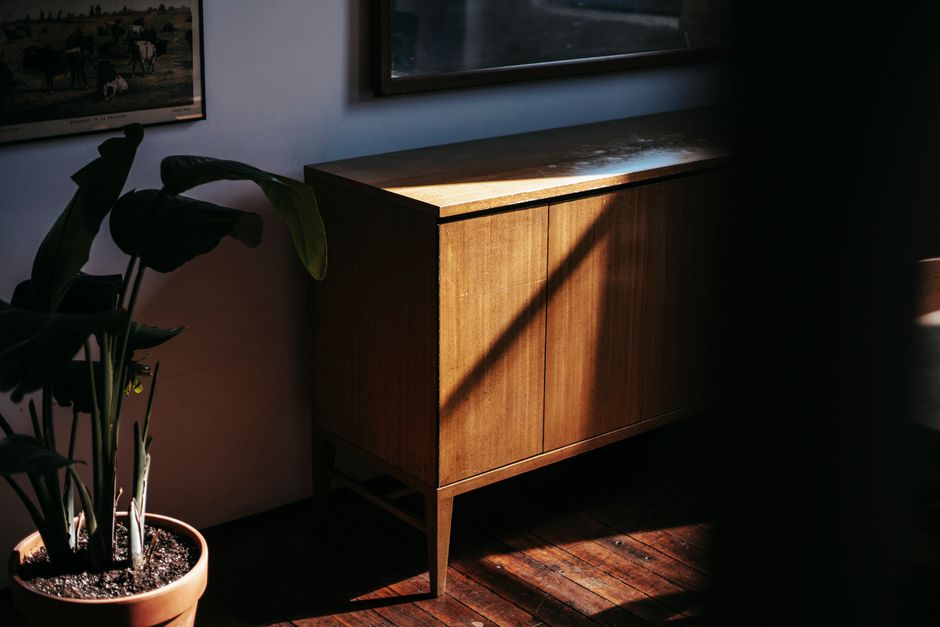 Oak Console using one repeated accent color — home · Home Decor