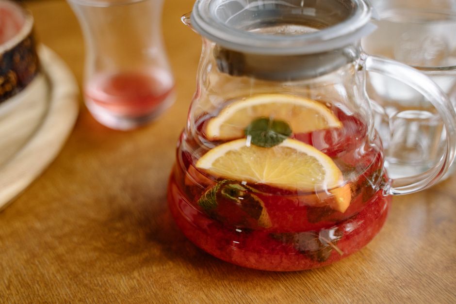 Pomegranate Mint Tea with basil leaves — food · Drinks