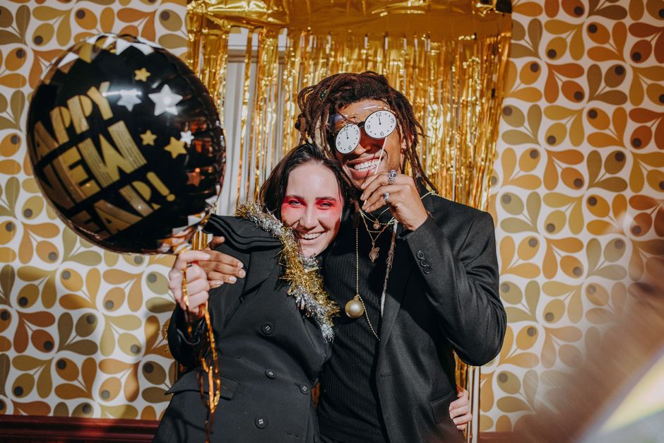 guest new year's activities that keep the room lively around a themed snack table — celebrations · New Year's