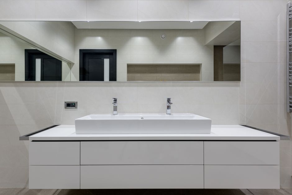 Floating Vanity with a gallery-style arrangement — home · Bathrooms