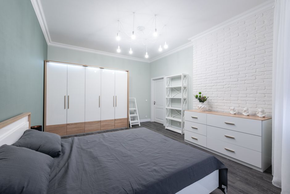 Under-Bed Drawer using mixed wood tones — home · Bedrooms