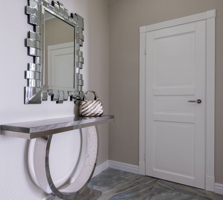 Compact Foyer with coordinated hardware — home · Interior Design