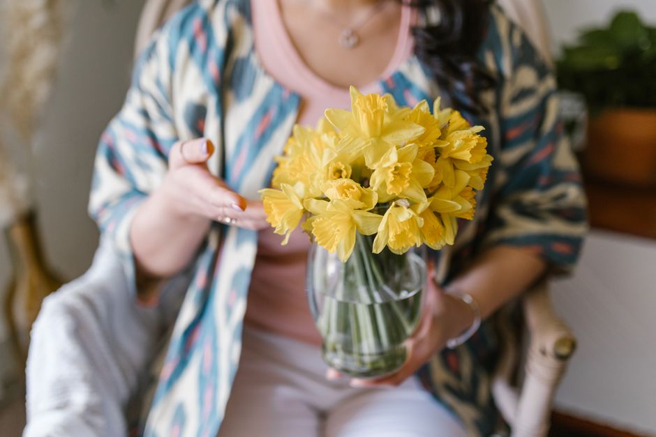 Daffodil bunch in a blue pitcher