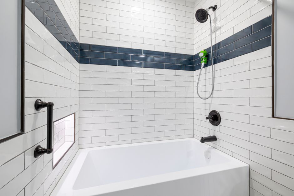 Shower Niche using mixed wood tones — home · Bathrooms