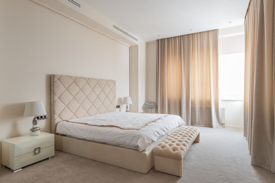 Upholstered Headboard with a soft curved silhouette — home · Bedrooms