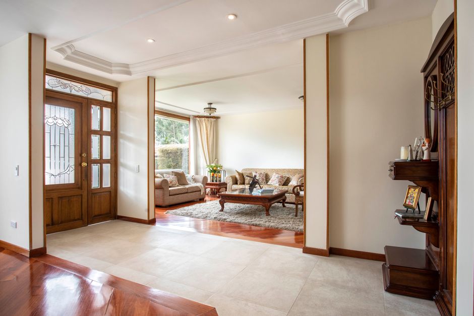 Compact Foyer using mixed wood tones — home · Interior Design