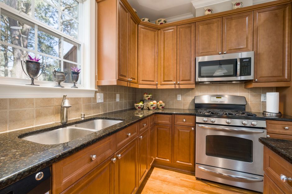 Mixed-Material Kitchen using one-color repetition — home · Interior Design