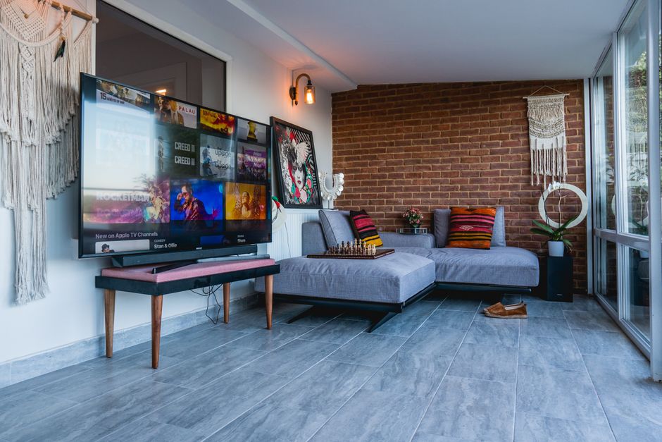 Media Console using mixed wood tones — home · Living Rooms