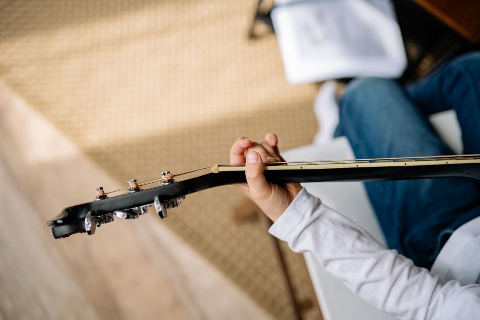 Beginner Guitar with a friend nearby — lifestyle · Hobbies